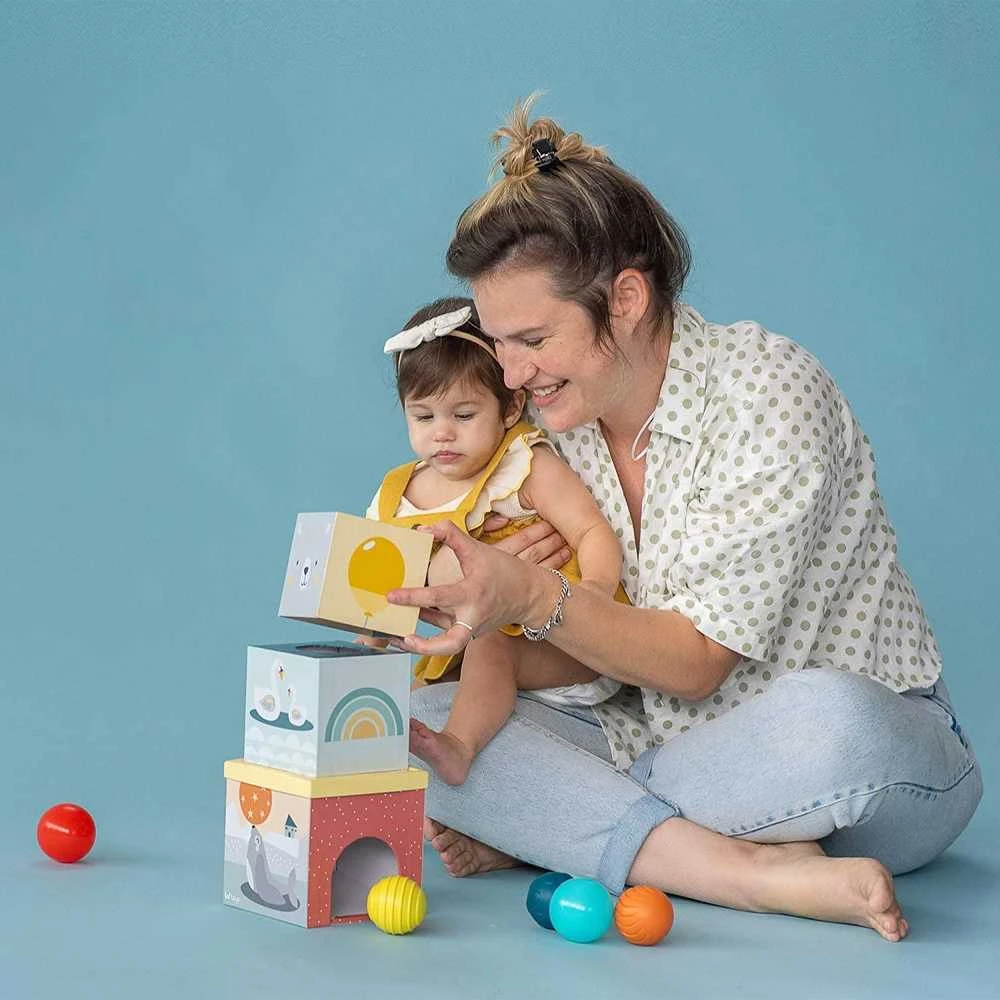 Taf Toys lavinamasis žaislas kubų bokštas North Pole Ball Drop Stacker