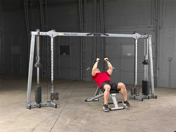 Kryžminės traukos treniruoklis Deluxe Body-Solid GDCC250