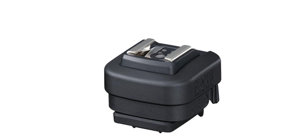 „Canon“ daugiafunkcis batų adapteris AD-E1