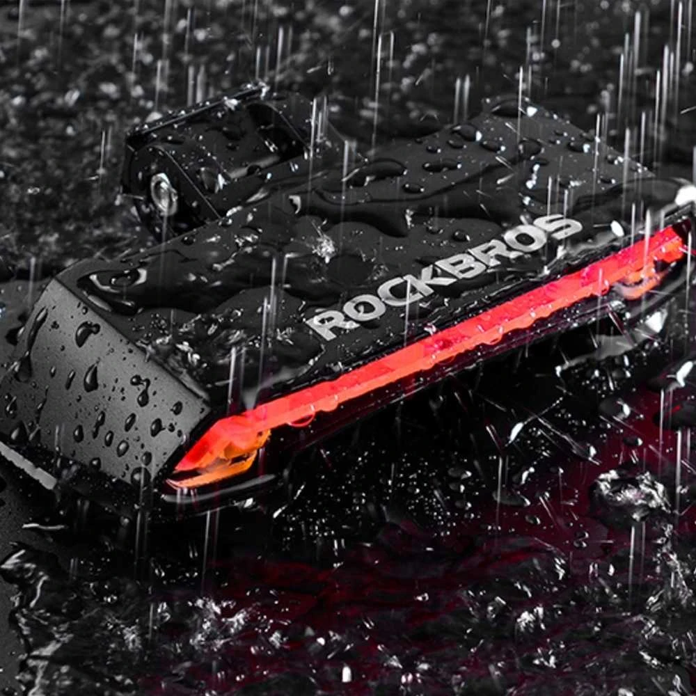 Rockbros Galinis dviračio žibintas su lazeriniu nuotolinio valdymo pulteliu ir USB-A posūkio signalo funkcija