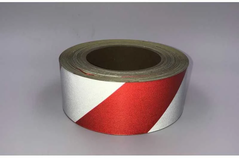 Juosta atšvaitinė 50mm x 1m BALTA/RAUDONA klijuojama ( į kairę)