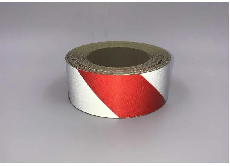 Juosta atšvaitinė 50mm x 1m BALTA/RAUDONA klijuojama ( į dešinę)