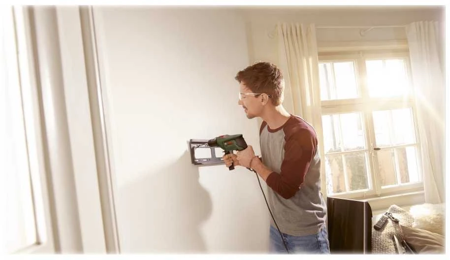 Bosch smūginis grąžtas - Easyimppact 600 (tiekiamas dėžutėje su 1 papildoma rankena ir 1 gylio atrama)