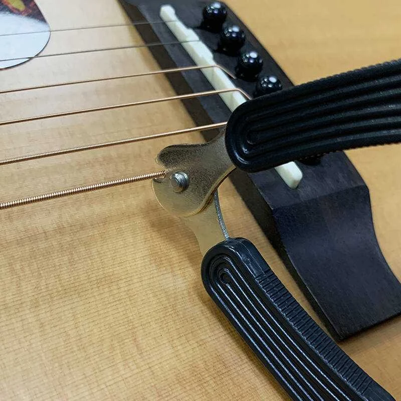 Gitaros stygų keitimo įrankis MOGE MG-2