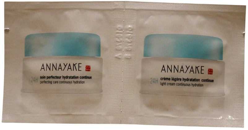 Tobulinamasis priežiūros rinkinys Annayake: 24 val., drėkinamasis, vietinis kreminis, veidui, 1 ml *Mėginys + 24 val., drėkinamasis, kreminis, veidui, 1
