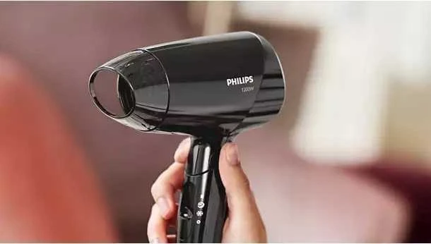 Sulankstomas plaukų džiovintuvas Philips 1200 W – lengvas ir patogus kelionėms.