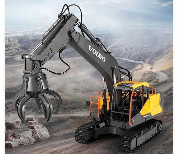 Ekskavatorius Volvo su nuotolinio valdymo pultu ir priedais