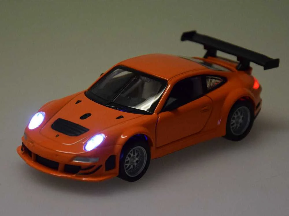 Metalinis automobilis Porsche 911 GT3 RS su garso ir šviesos efektais, oranžinis