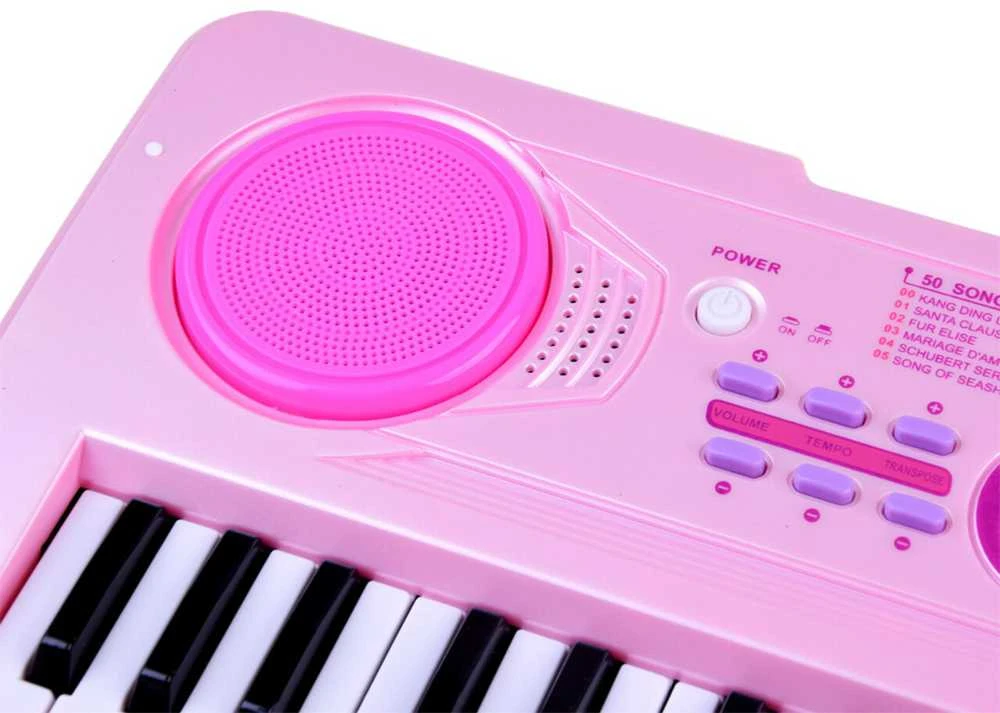 Vaikiškas pianinas su mikrofonu ir šviečiančiais klavišais, rožinis