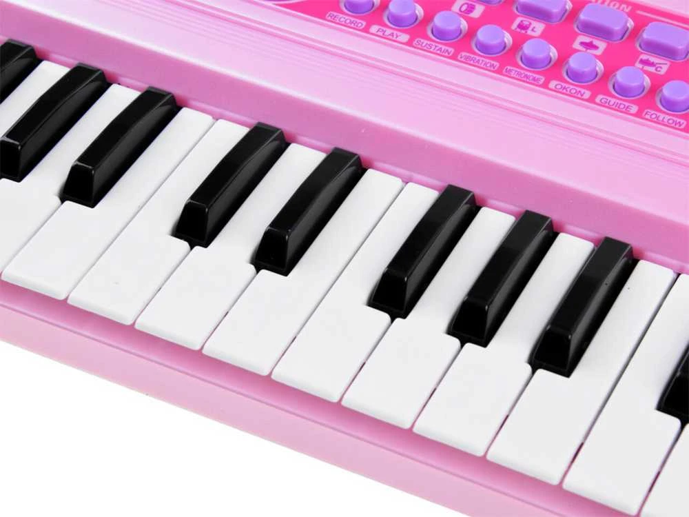Vaikiškas pianinas su mikrofonu ir šviečiančiais klavišais, rožinis