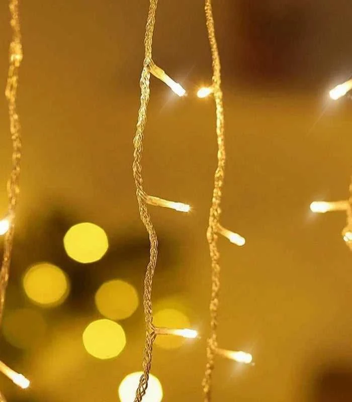 Kalėdinė girlianda - varvekliai 12 m, ŠILTAI BALTA. 300LED