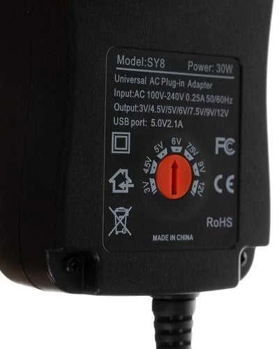 Universalus įkroviklis, maitinimo šaltinis 3-12V AC 100 - 240 0.25A 50/60Hz