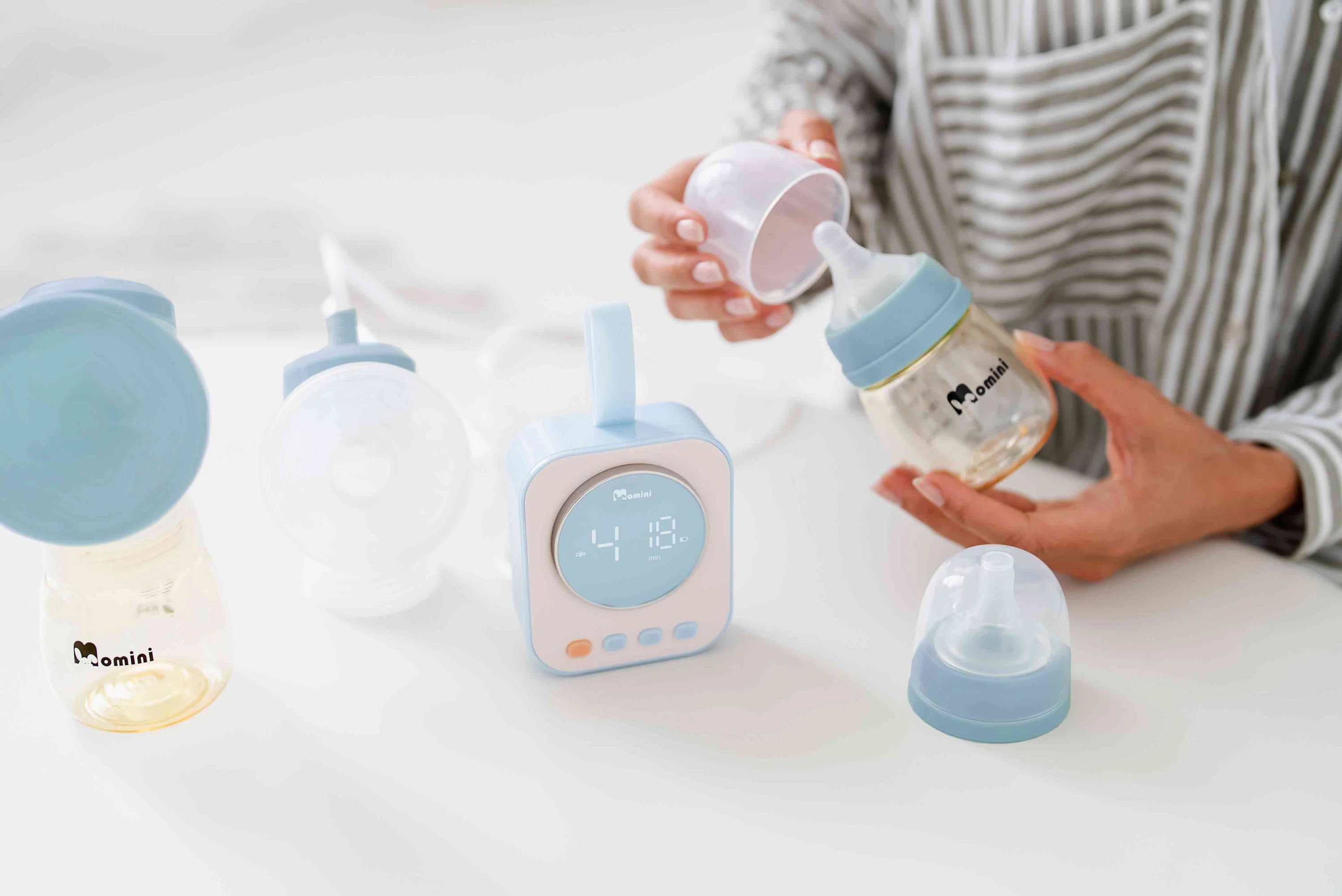 Momini TwinPump dvigubas belaidis elektrinis pientraukis aprašymas - Prekės nuotrauka