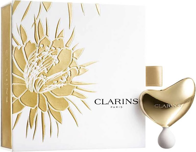 „Clarins“ brangusis auksinis veido masažo akmuo