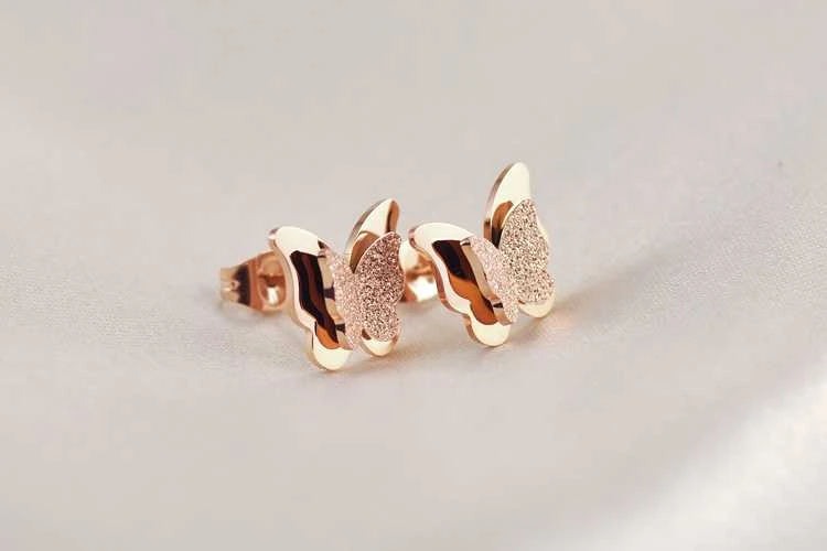 Troli Maži drugelių auskarai Metaliniai drugeliai KES-048-ROSEGOLD