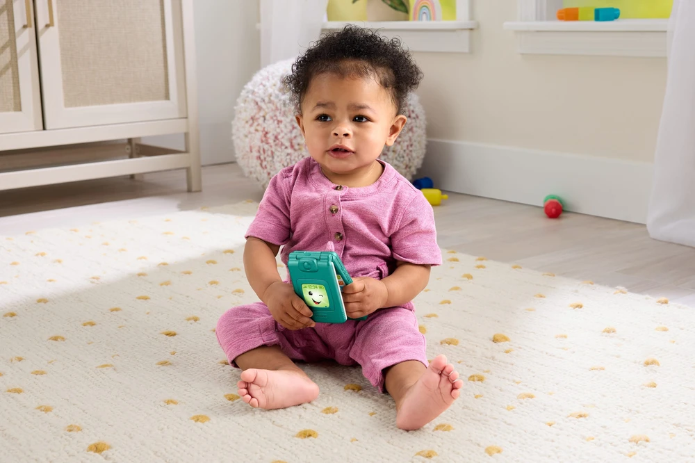 Mattel Fisher-Price „Ucz się i śmiej!” Edukacyjny Interaktyvus telefonik su klapką