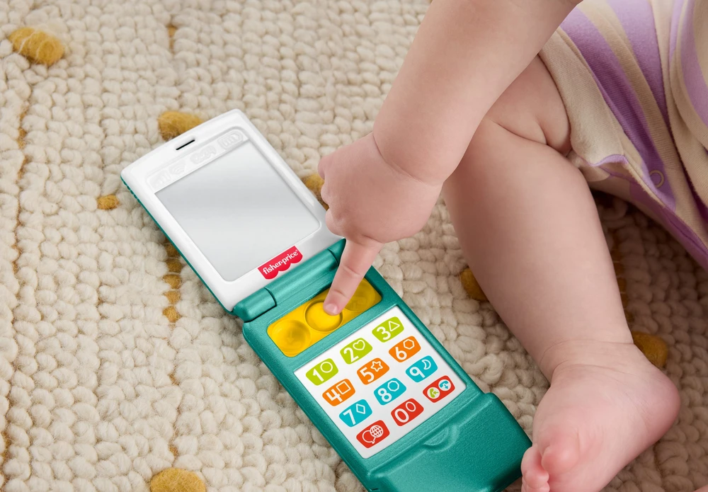 Mattel Fisher-Price „Ucz się i śmiej!” Edukacyjny Interaktyvus telefonik su klapką