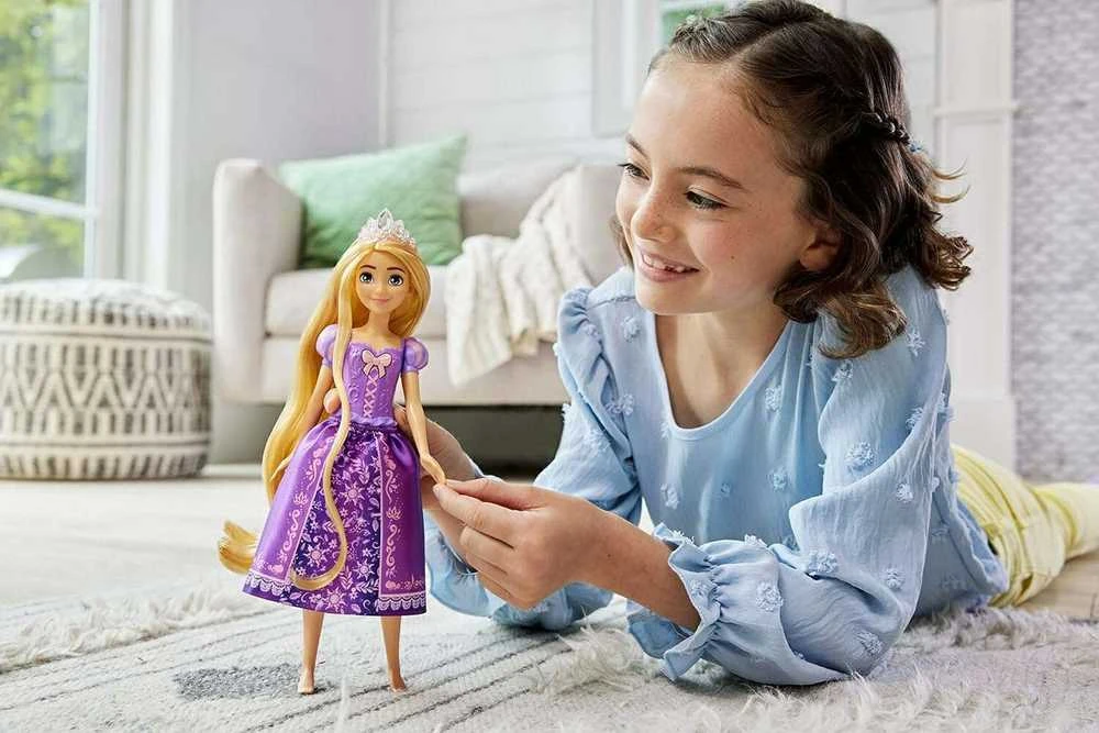 DISNEY PRINCESS dainuojanti lėlė Auksaplaukė (anglų kalba) (HPD41)