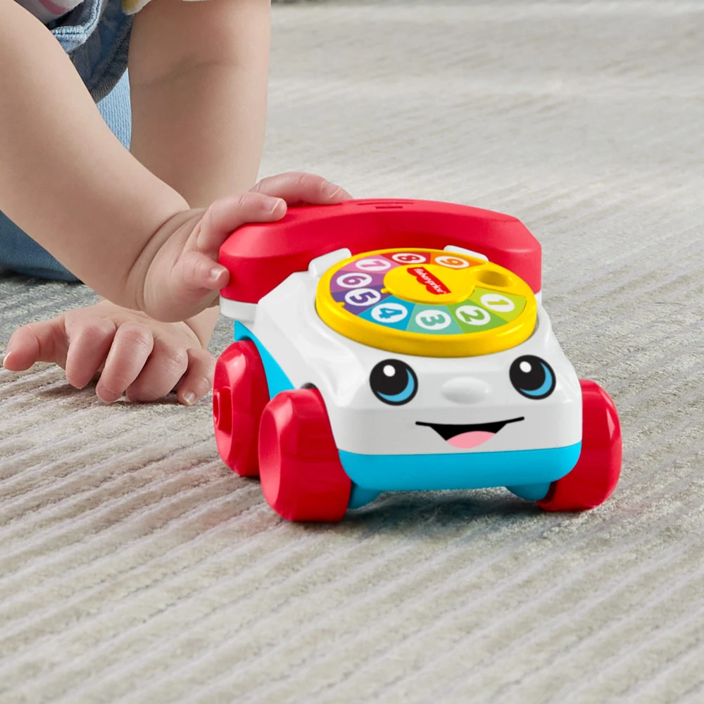Fisher-Price - klasikinė „Chatting“ telefono transporto priemonė (JKD56)