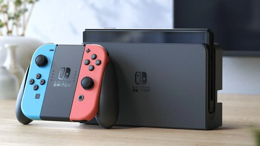Nintendo Switch OLED konsolė (su Neon Raudona ir Neon Mėlyna Joy-Con)