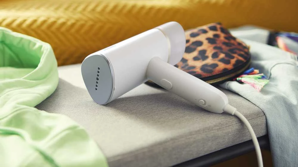 Philips 3000 serijos rankinis garintuvas STH3020/10 Kompaktiškas ir sulankstomas Paruoštas naudoti per ~30 sekundžių 1000W, iki 20g/min. Nereikia lyginimo lentos