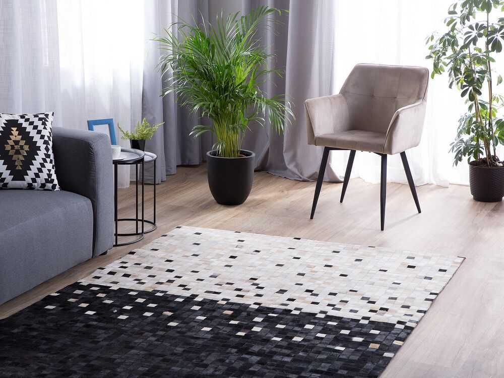 Beliani Kiliminis ERFELEK juodas 140 x 200 cm natūrali oda
