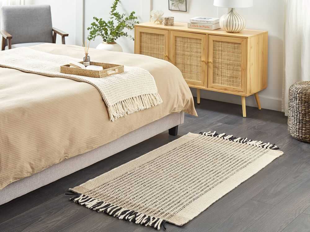 Beliani Kilimas DIVARLI smėlio spalvos 80 x 150 cm vilnonis