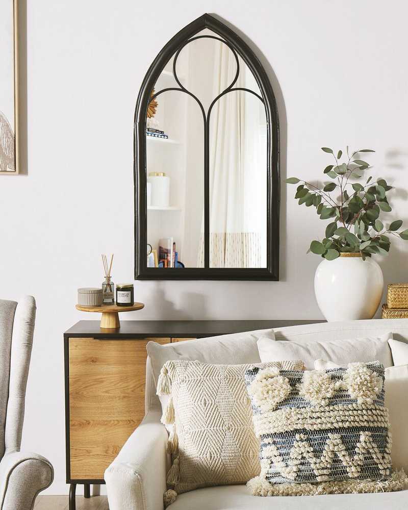 Beliani Sieninis veidrodis TRELLY 62 cm 113 cm metalinis juodas