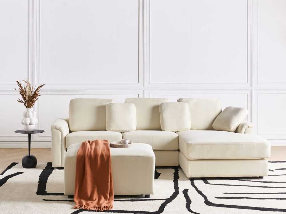 Beliani Kampinė sofa KOHLO 4 asmenims, šviesiai smėlio spalvos, su otomana, kairinė