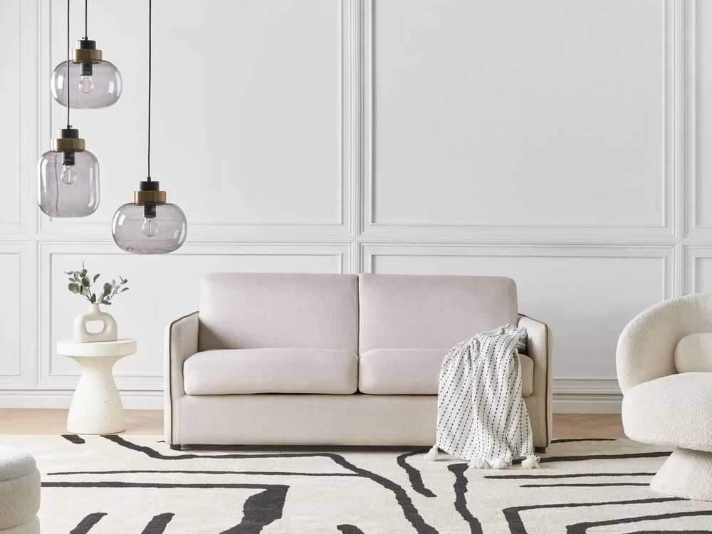 Beliani Dvivietė išskleidžiama sofa ISHOJ, šviesiai smėlio spalvos