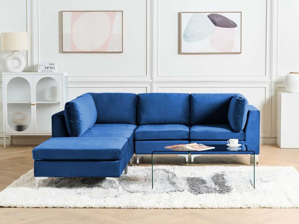 Beliani EVJA modulinė kampinė sofa 4 asmenims su pufu, aksominė, tamsiai mėlyna, dešininė