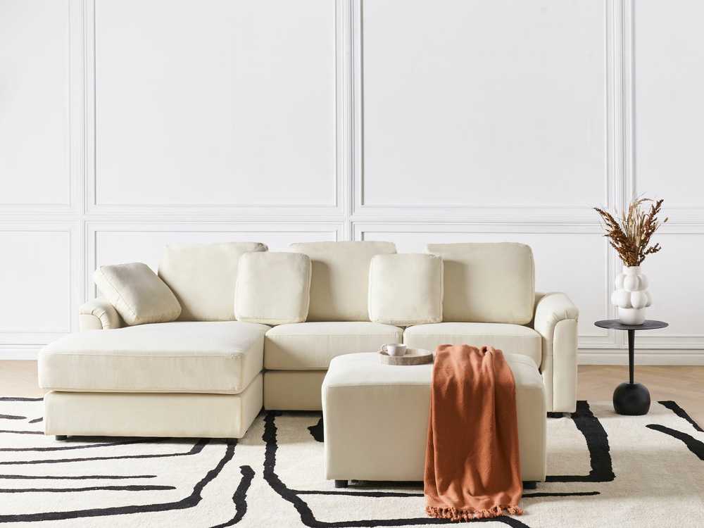 Beliani 4 vietų kampinė sofa KOHLO šviesiai smėlio spalvos su pufu dešininė