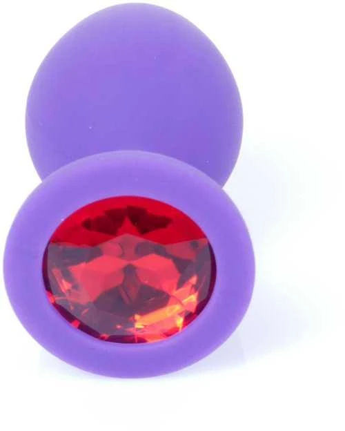 Violetinis analinis kištukas su raudonu kristalu