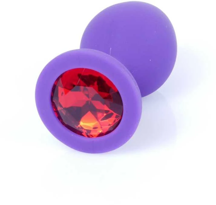 Violetinis analinis kištukas su raudonu kristalu