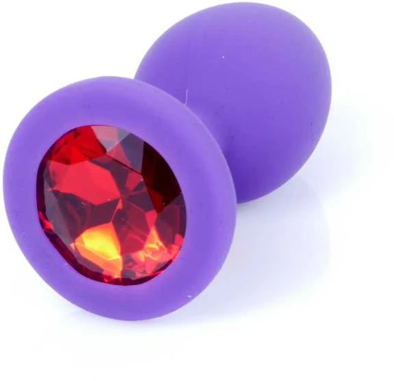 Violetinis analinis kištukas su raudonu kristalu
