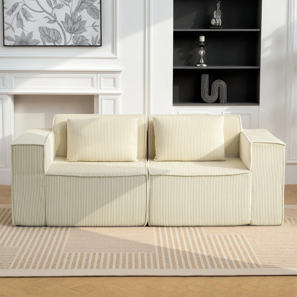 Fotelis Trivietė sofa, minkšta porolono konstrukcija, platūs porankiai, 2 pagalvės, velvetinis audinys, smėlio spalvos