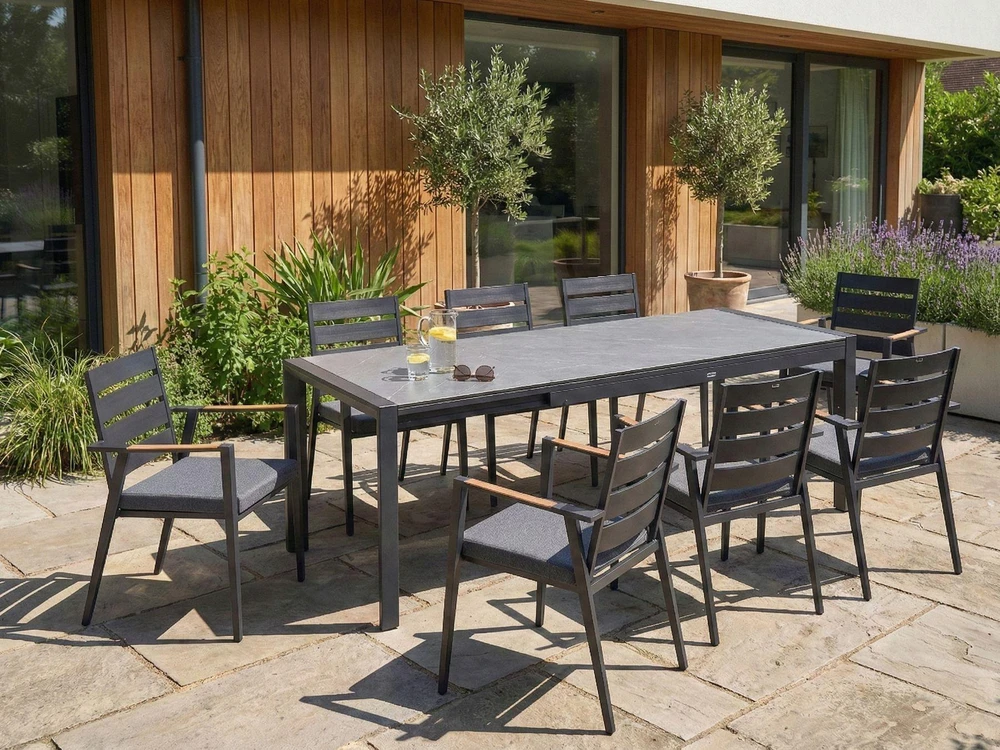Beliani Išskleidžiamas sodo stalas BINASCO 160/220 cm 90 cm akmens imitacijos pilkas