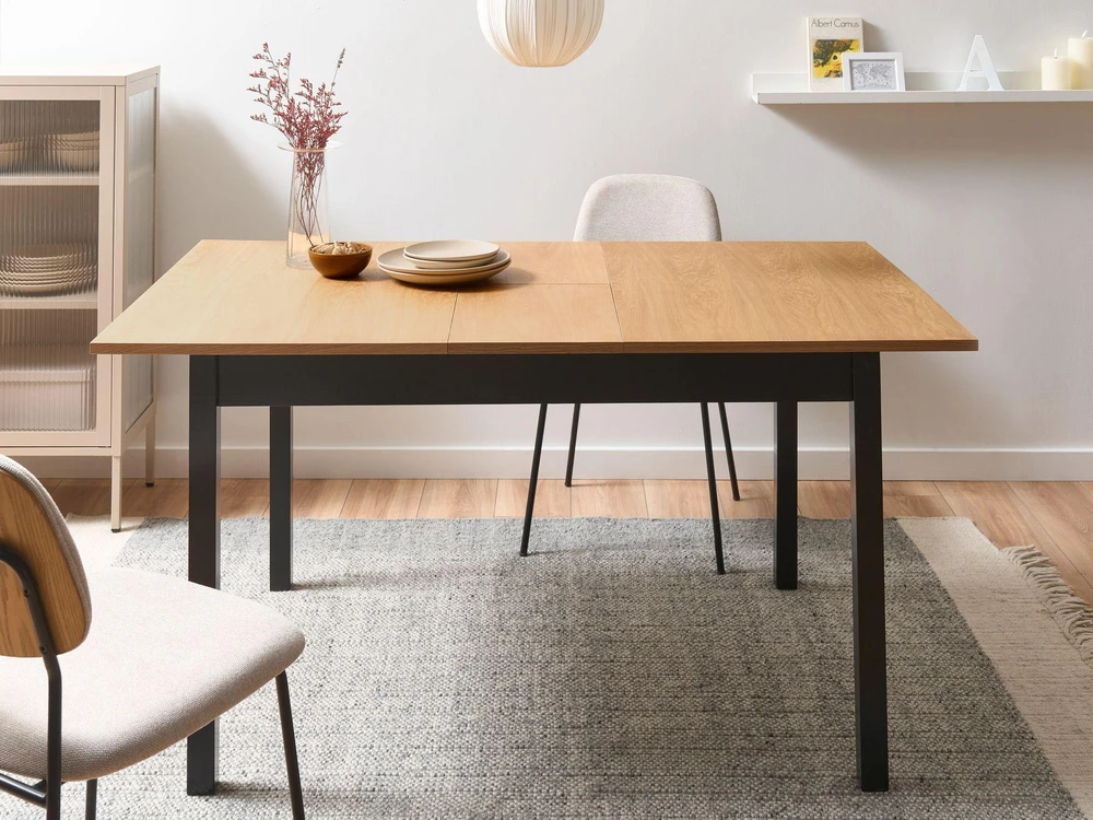 Beliani Išskleidžiamas valgomojo stalas HOUSTON šviesiai rudas/juodas 120/150 cm 90 cm pušies mediena