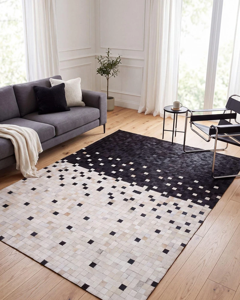 Beliani Kiliminis ERFELEK juodas 140 x 200 cm natūrali oda