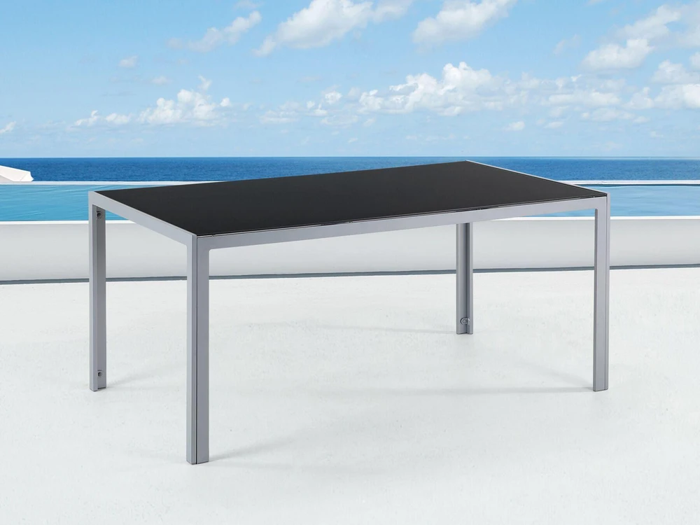 Beliani Sodo stalas CATANIA 160 cm 91 cm stiklinis juodas