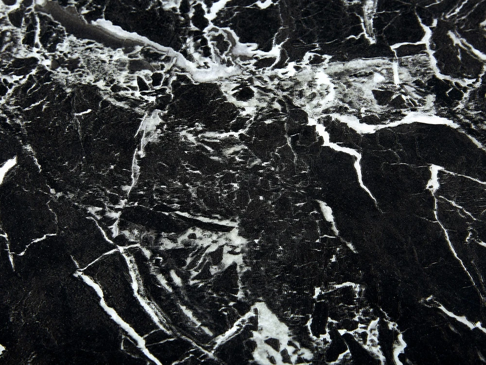Beliani Valgomojo stalas KENTON juodo marmuro spalvos 140x80 cm grūdinto stiklo