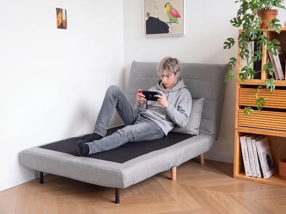 Beliani Vienvietė išskleidžiama sofa SETTEN, šviesiai pilka