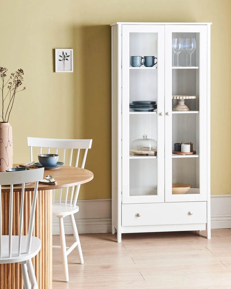 Beliani Vitrina su stiklinėmis durelėmis NORNALUP 80 cm, balta