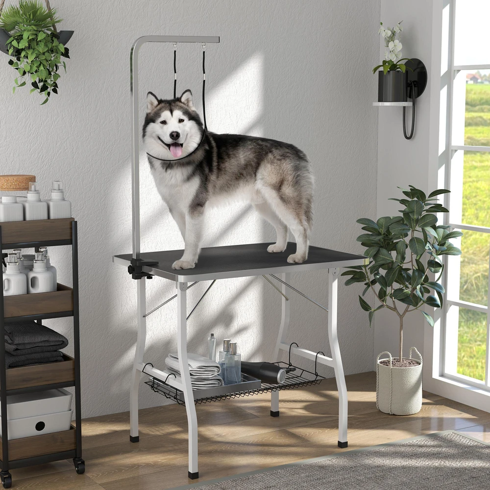 PawHut šunų priežiūros stalas, reguliuojamo aukščio, sulankstomas kirpimo stalas naminiams gyvūnams su tinkliniu krepšiu ir pavadėliais, iki 40 kg, juodas ir baltas