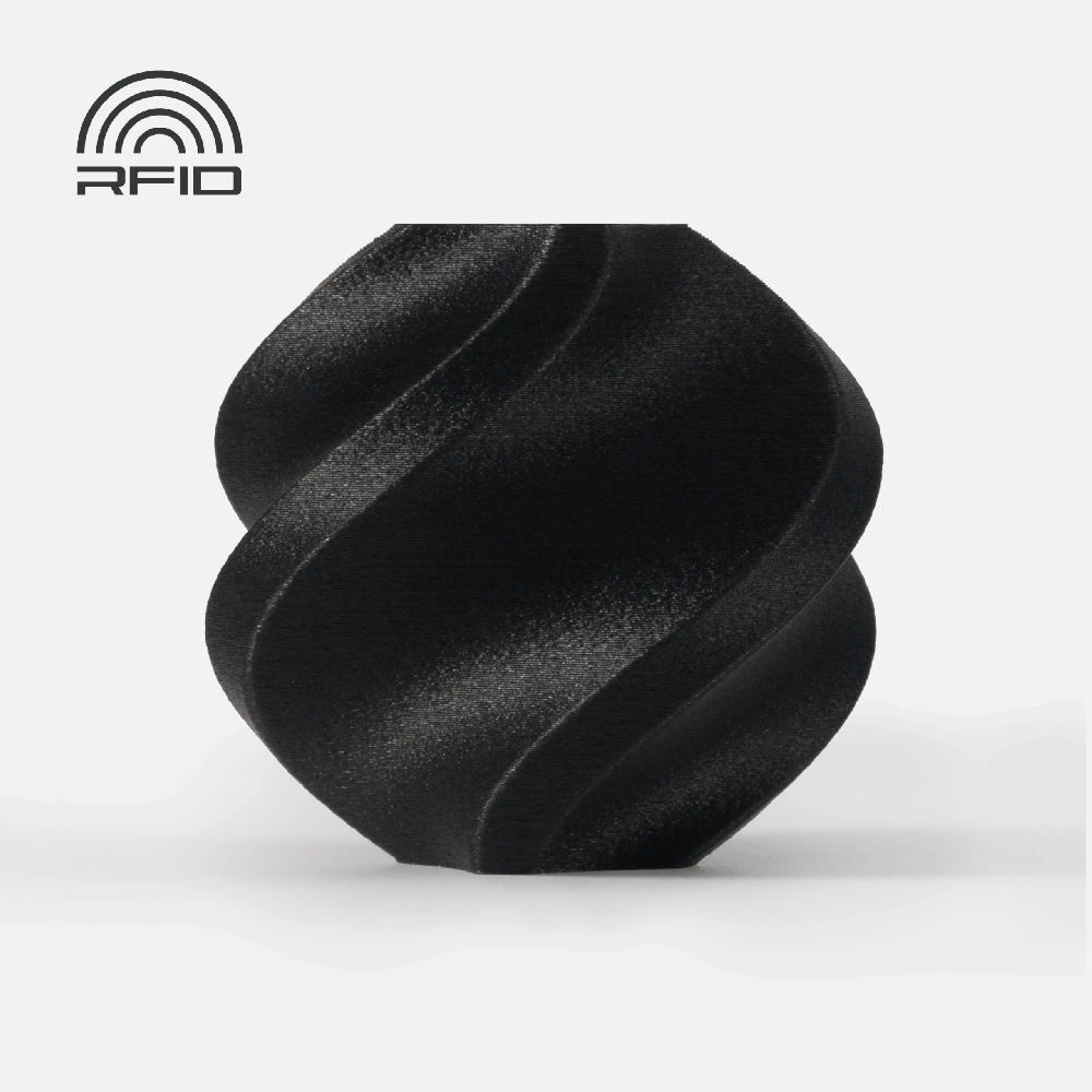 Bambu Lab PAHT-CF plastikas 1.75mm 0.5kg – komplektuojamas su daugkartinio naudojimo rite – Juodas