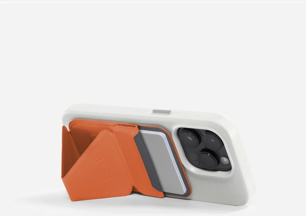 „Moft Movas Snap-On MagSafe“ magnetinė piniginė ir telefono laikiklis su saulės spinduliais
