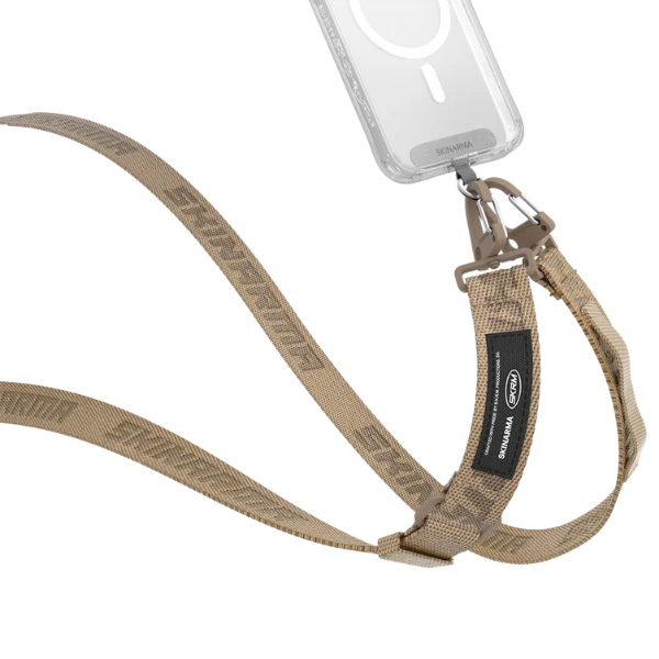 Skinarma Scout XE universali virvelė telefonui khaki aprašymas - Prekės nuotrauka Skinarma Scout XE universali virvelė telefonui khaki aprašymas - Prekės nuotrauka