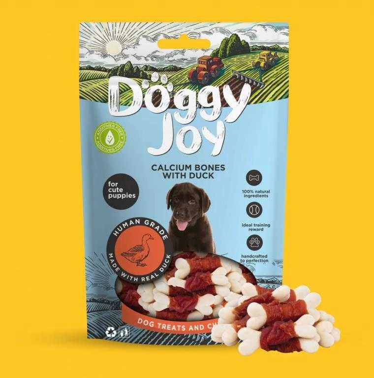 Petfest Doggy_Joy Antienos skanėstas ant kauliuko šuniukams DOGGY JOY, 90 g