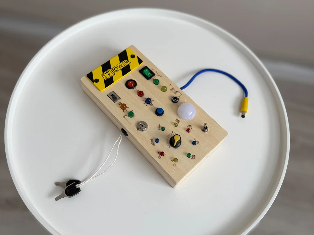 Jokomisiada medinė Montessori manipuliacinė lenta - elektrinės šviesos diodės ZA5944