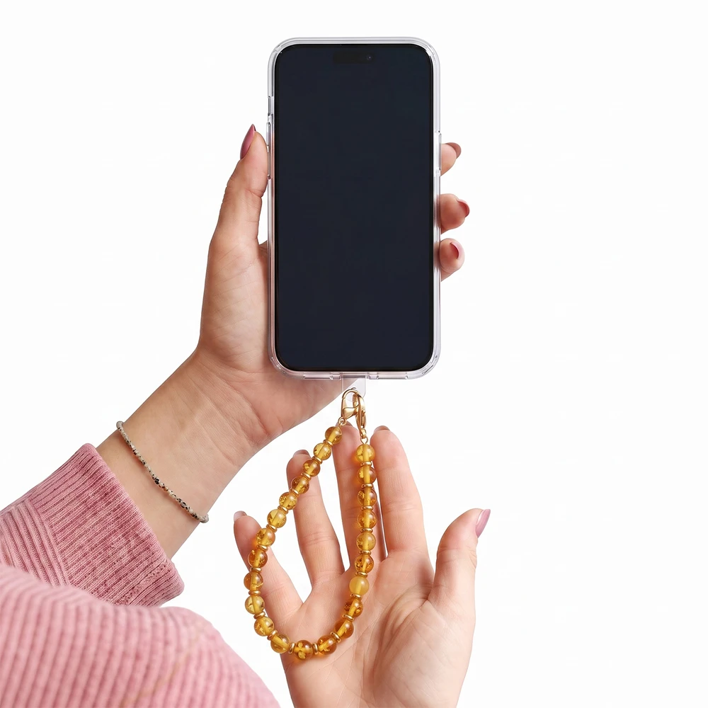 TFO Geltonas karoliukų telefono dirželis